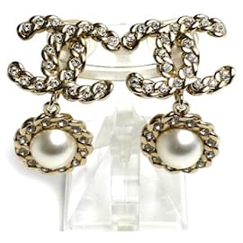 Orecchini a clip Chanel in metallo dorato e strass