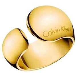 Anello aperto dorato Calvin Klein