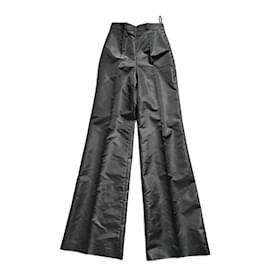 Pantalones anchos Prada de seda negros