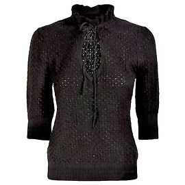 Ganni Top de punto negro con cuello de volantes