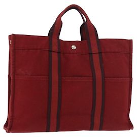 Hermès Sac Fourre Tout MM HERMES en toile rouge avec détails argentés Authentique gh2140