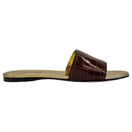 Sandali piatti slide in pelle marrone con effetto coccodrillo Prada