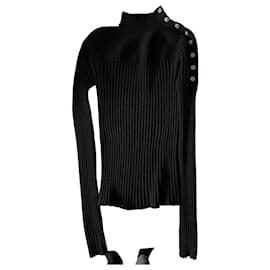 Chanel schwarzer Kaschmir-Rollkragenpullover mit Knöpfen