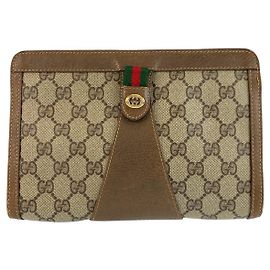 Clutch Gucci Vintage GG Supreme in tela e pelle