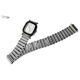 Montre bracelet vintage Saint Laurent en acier inoxydable noir et argent - Yves Saint Laurent