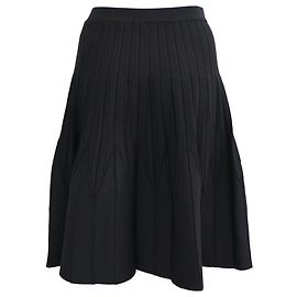Gonna midi svasata in maglia a coste Sandro in viscosa nera