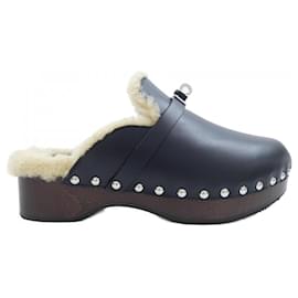 Hermès Shearling-Schuhe