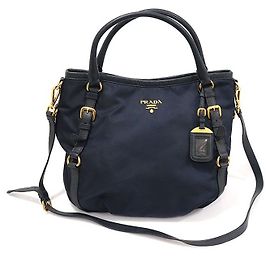 Prada Nylon Tessuto blu navy e pelle di vitello morbida con scritte