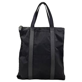 Borsa in nylon nero e pelle Prada