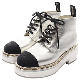 Botas de cuero y tela con logotipo Coco de Chanel