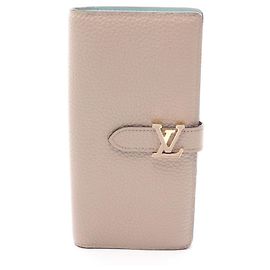 Cartera larga bipliegue en cuero beige Louis Vuitton