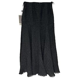 Falda midi Alexander McQueen en algodón negro con acabado de bordes deshilachados
