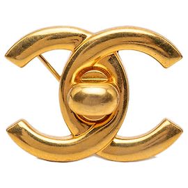 Spilla Chanel Vintage Coco Mark Turnlock