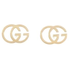Orecchini Gucci GG Stud in oro giallo 18K