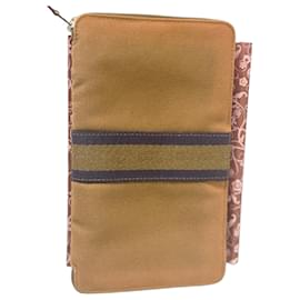 Hermès Cartera de lona marrón con cremallera y banda contrastante