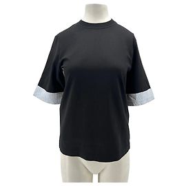 Laurence Bras Schwarzes T-Shirt mit gestreiftem Saum