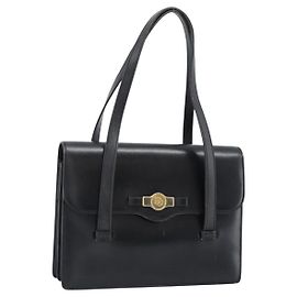 Borsa Christian Dior in pelle nera e oro Auth 185093
