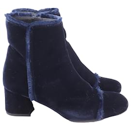 Stivali Stuart Weitzman con bordo a taglio vivo in velluto blu
