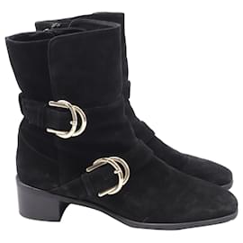 Botines con hebilla Britain de Stuart Weitzman en ante marrón