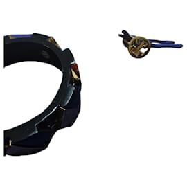 Tory Burch Bracciale rigido geometrico nero e oro