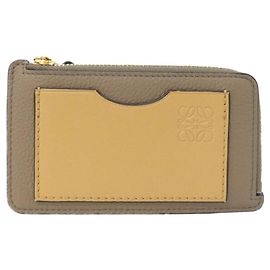 Monedero de piel de becerro Loewe en beige y oro