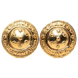 Pendientes de clip redondos con logo Chanel chapados en oro