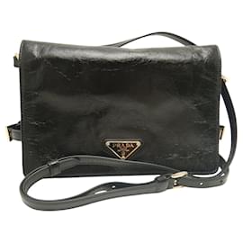 Borsa a tracolla Prada in pelle di vitello stropicciata nera