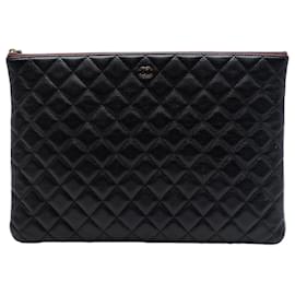 Clutch Chanel Black Large Quilted Caviar O Case