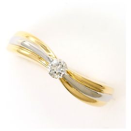 Autre Marque Anello a fascia in platino e oro giallo con diamante