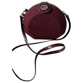 Gucci Borsa a tracolla rotonda in tela monogramma e pelle bordeaux