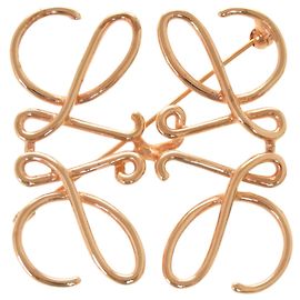 Spilla in metallo oro rosa Anagram Loewe