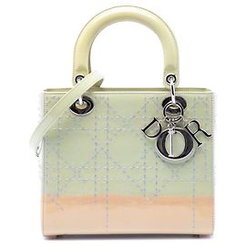 Lady Dior in vernice cannage verde medio ombre