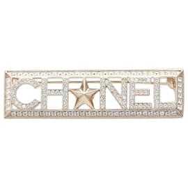 Spilla Chanel placcata oro e strass