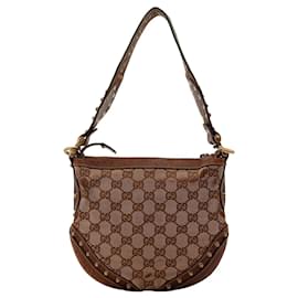 Gucci Bolsa Hobo em Lona Monograma com Tachas