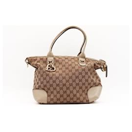 Borsa Tote Gucci in Tela Monogram con Charm a Cuore