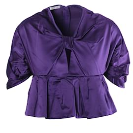 Top peplum en soie violette avec nœud de la collection printemps 2007 de Prada