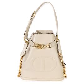 Borsa bucket medium C'est in pelle di vitello beige con logo CD in rilievo Christian Dior