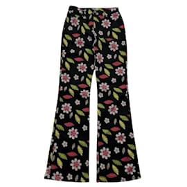 Moschino Jeans Vaqueros acampanados negros estampado floral