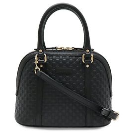 Borsa a mano in pelle nera Microguccissima Gucci
