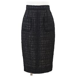 Falda de tweed y malla Chanel