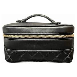 Necessaire de maquiagem em couro bicolor Chanel