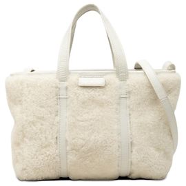 Borsa shopper Barbes East West Small in shearling e pelle bianca Balenciaga