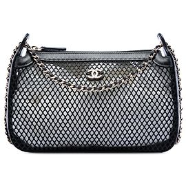 Clutch Chanel Black CC de malla y piel de cordero brillante con cadena
