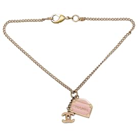 Pulsera Charm Chanel 31 Rue Cambon en baño de oro y esmalte CC Gold