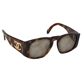 Pasador Chanel Coco mark chapado en oro