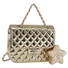 Mochila Chanel Hollywood Boulevard con Monedero Star Coin Purse en Cuero Metalizado Acolchado