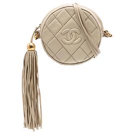 Chanel Borsa a tracolla rotonda in agnello trapuntato CC marrone con nappa