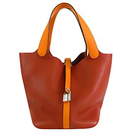 Hermès Picotin Lock 22 bicolore arancione in pelle Clemence e Swift