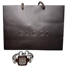 Relógio de pulso vintage Gucci em aço inoxidável e couro marrom prata