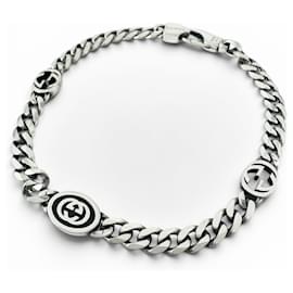 Bracciale con charm Interlocking G Gucci